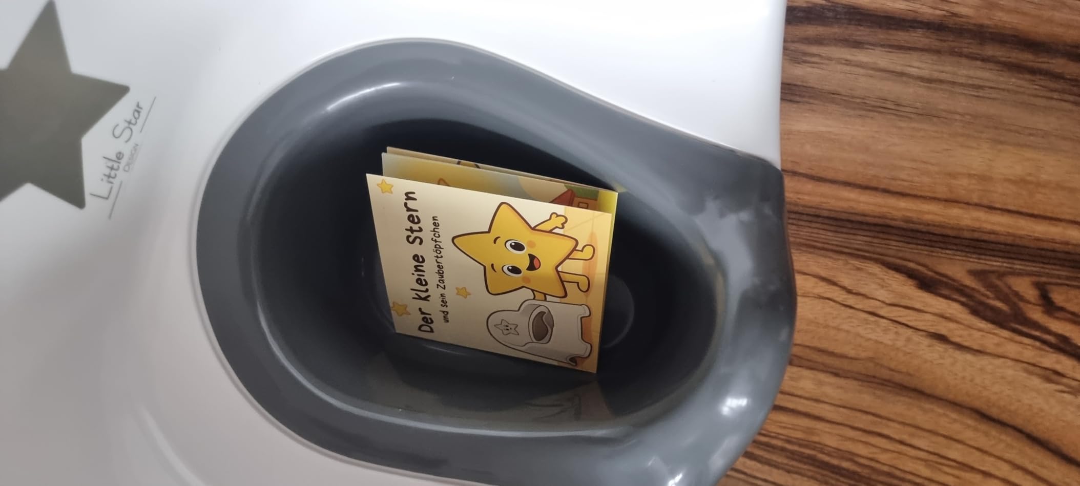 Little Star Topfstuhl mit Bilderbuch und Spritzschutz